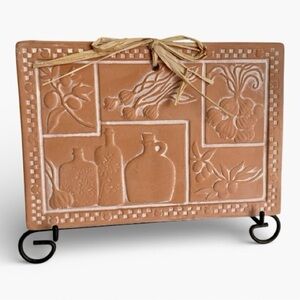 Susan Winget Terra Cotta bread warming tile, for use in a bread basket